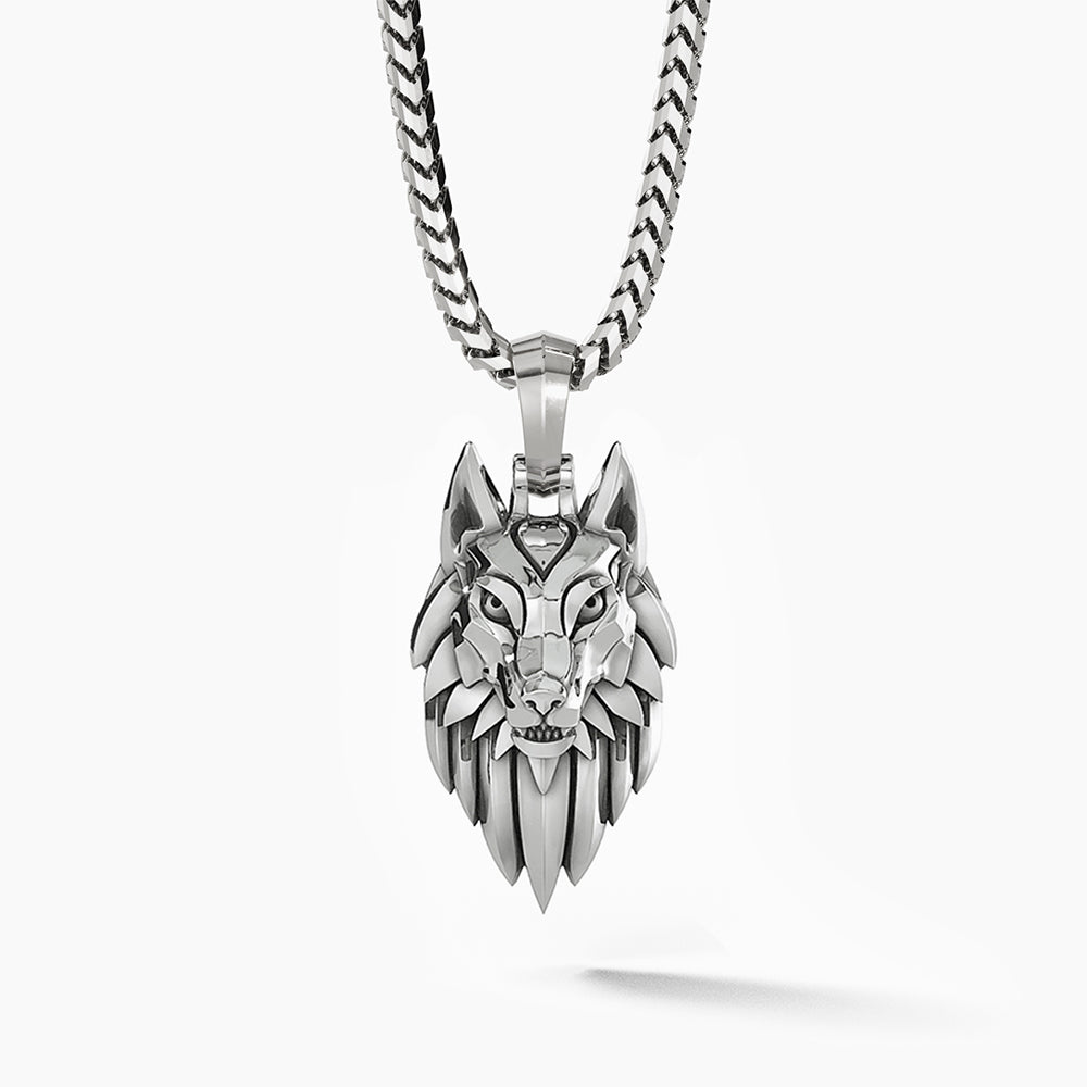 a sleek silver wolf pendant hangs from a franco chain