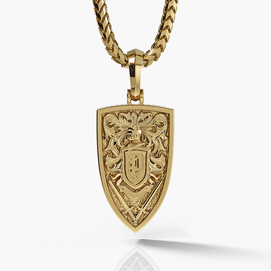 The back of a gold lion pendant features a crest with a knight's helmet and swords