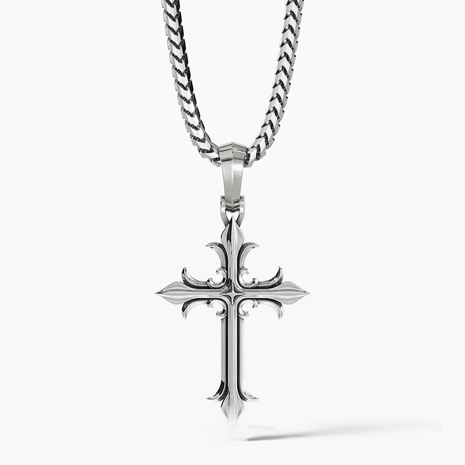 a unique sterling silver cross necklace hangs from a chain