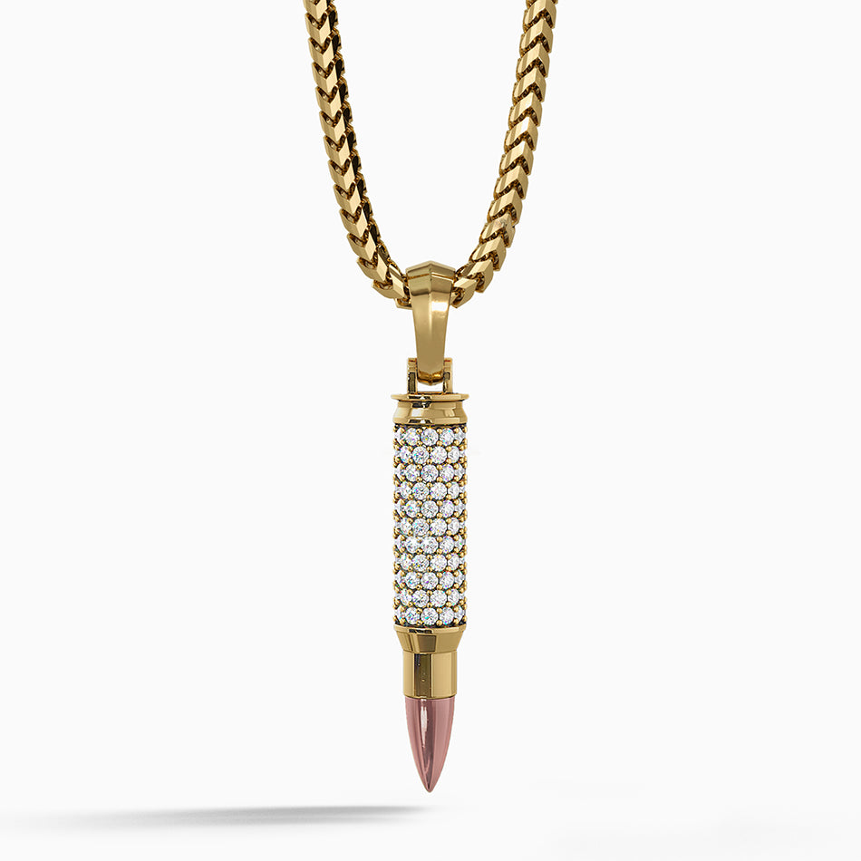 A diamond bullet pendants dazzles with lights as it hangs from a gold chain