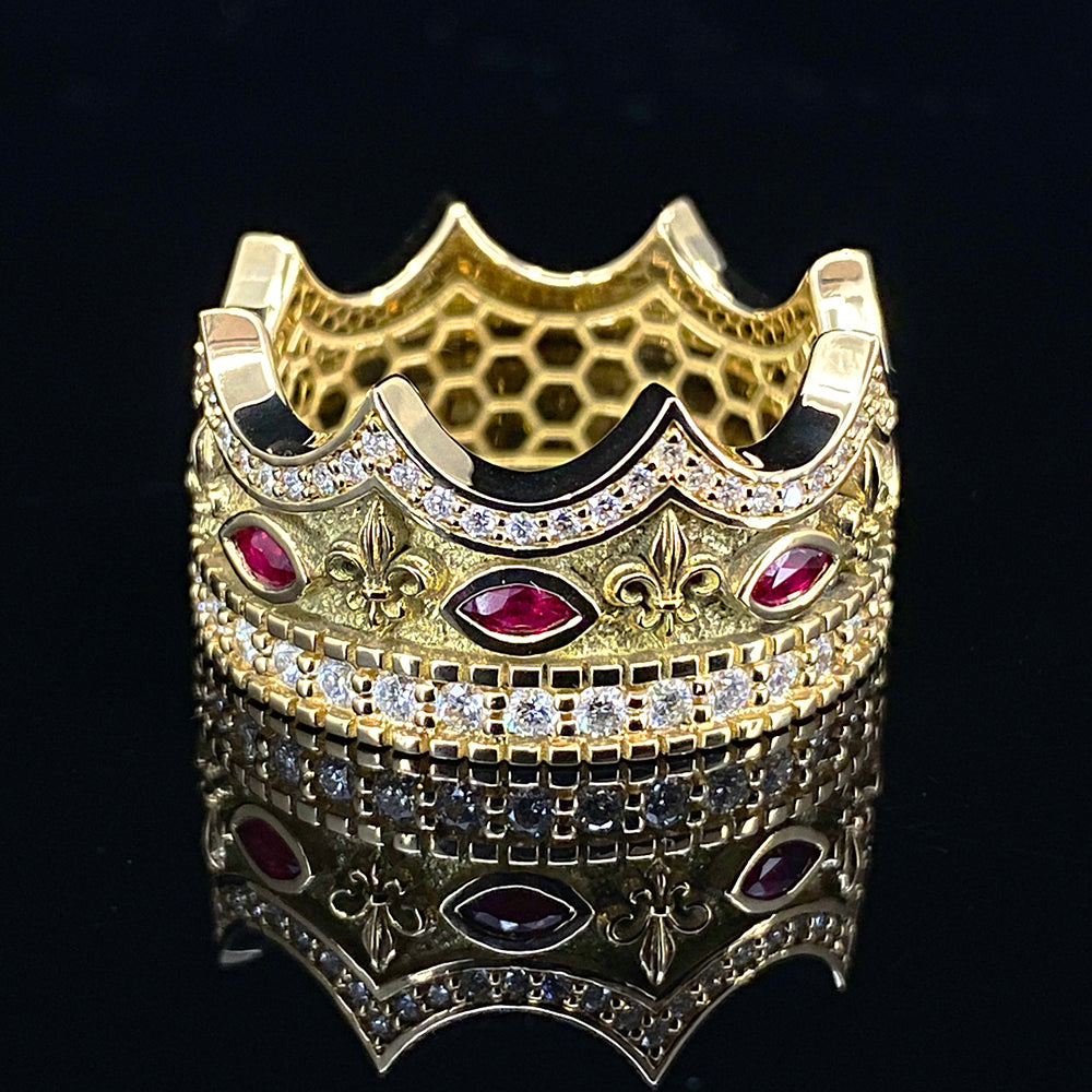 this mens gold wedding band is a crown with diamonds and rubies